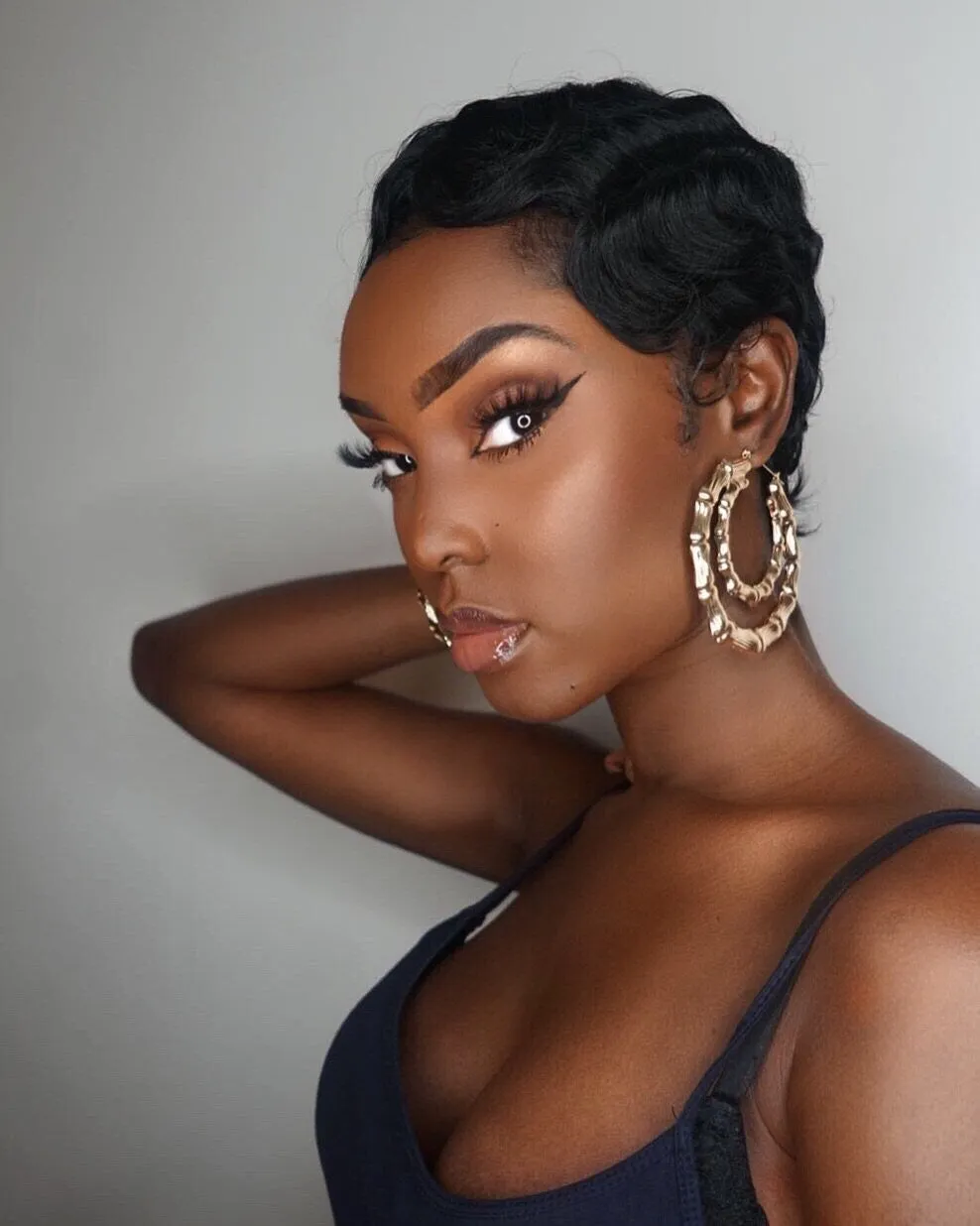 Pana: Black Short Curly Heat Resistant Synthetic Fibre Wig